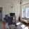 a living room with a couch and a tv