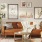 spacious living room with wood-style flooring and a connected kitchen area